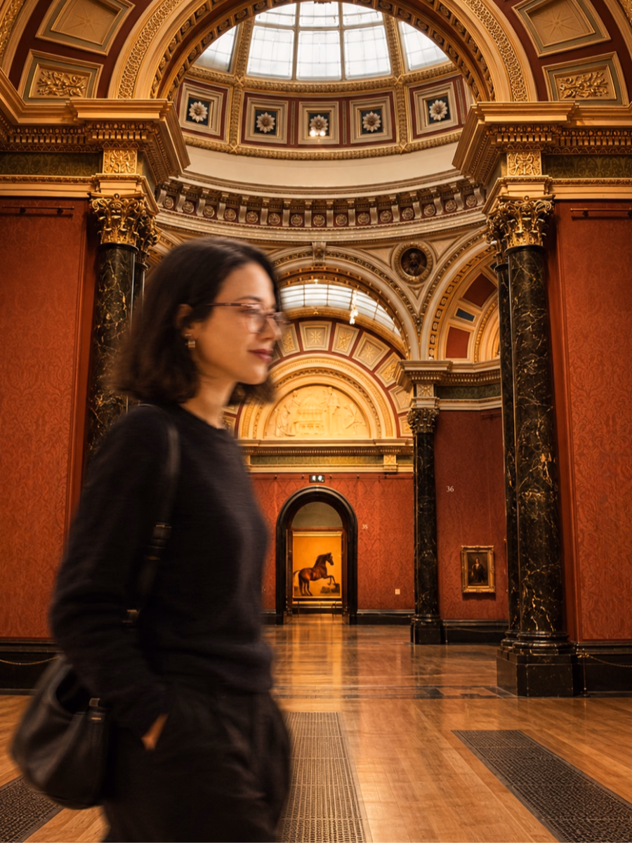 Pam standing in a gallery